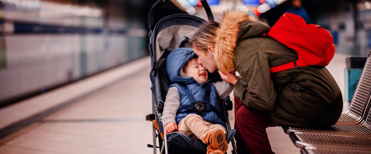 copy-space-love-family-two-metro-together-tenderness-refugee-waiting-for-train-winter-outfit_t20_VG1WkG